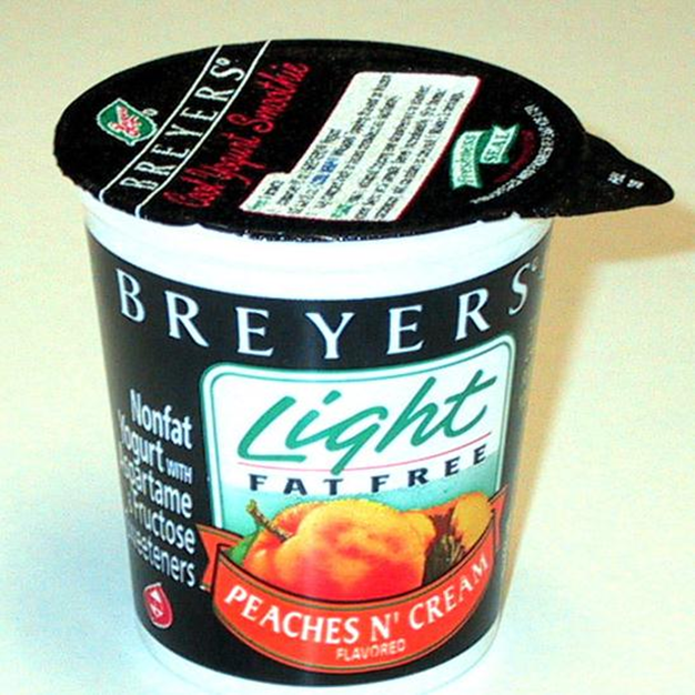 A yogurt with a leaking top